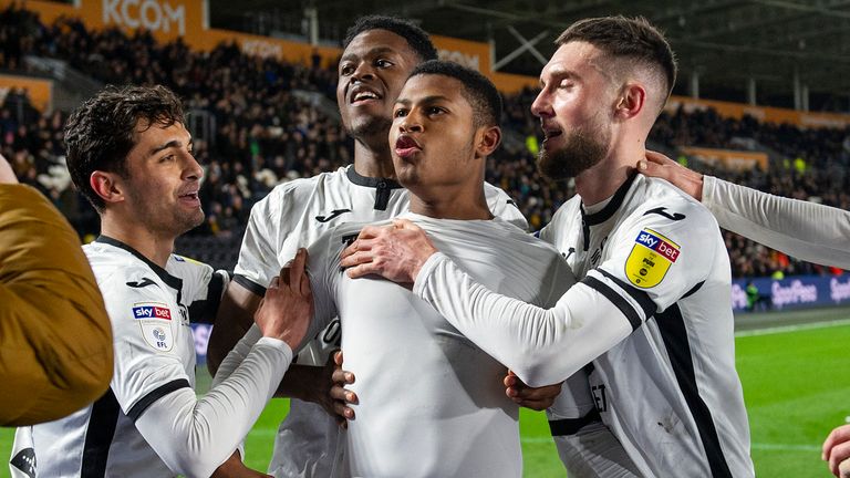 Rhian Brewster of Swansea City celebrates scoring his side's fourth goal against Hull