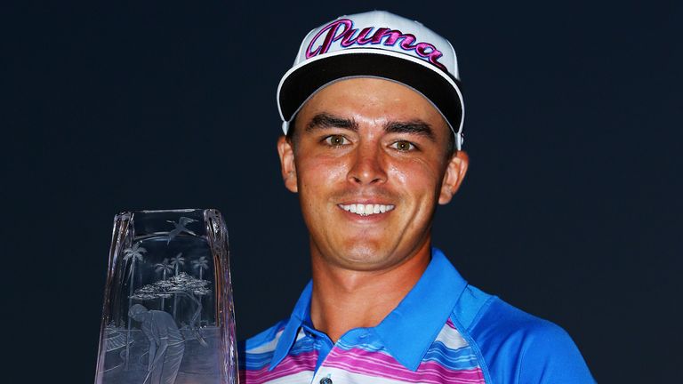 Rickie Fowler displays the trophy after clinching victory in The Players Championship in 2015