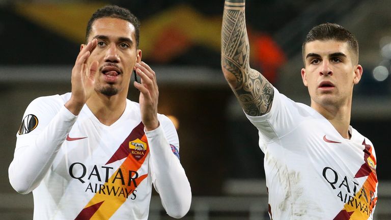 Chris Smalling and Gianluca Mancini celebrate after Roma progress