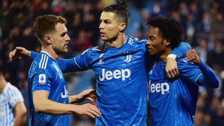 FERRARA, ITALY - FEBRUARY 22:  Cristiano Ronaldo (L) of Juventus celebrates his first goal with his teammates during the Serie A match between SPAL and  Juventus at Stadio Paolo Mazza on February 22, 2020 in Ferrara, Italy.  (Photo by Pier Marco Tacca/Getty Images) *** Local Caption *** Cristiano Ronaldo