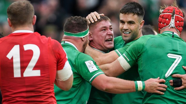 Tadhg Furlong is congratulated after scoring Ireland's second try against Wales