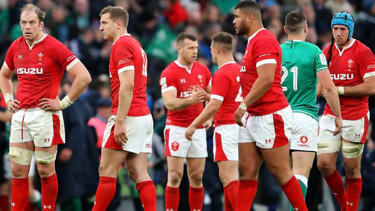 Dejected Wales players after their loss to Ireland