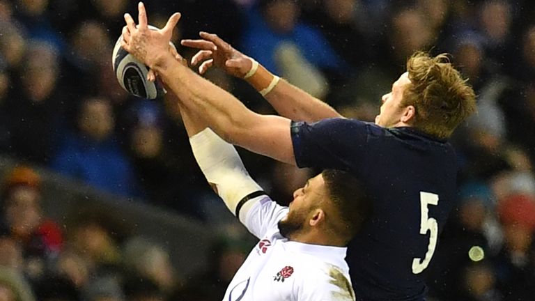 England's flanker Lewis Ludlam and Scotland's lock Jonny Gray compete for the ball in the line-out 