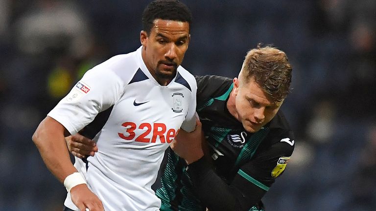 Preston North End's Scott Sinclair battles with Swansea City's Jake Bidwell