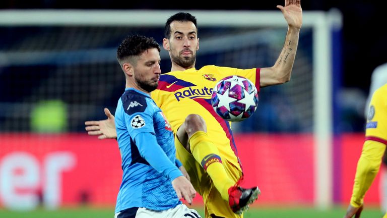 Sergio Busquets launches into Mertens to end his night with a late challenge