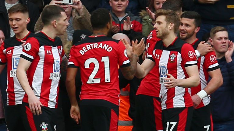 Shane Long celebrates his goal against Villa with his team-mates