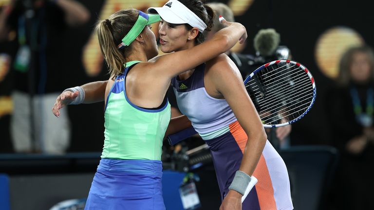 Sofia Kenin of the United States embraces Garbine Muguruza of Spain after their Women's Singles Final match on day thirteen of the 2020 Australian Open at Melbourne Park on February 01, 2020 in Melbourne, Australia