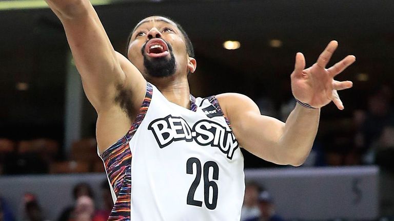 Spencer Dinwiddie stretches for a lay-up against the Pacers