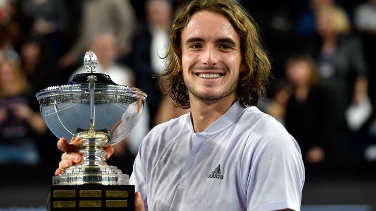 Greece's Stefanos Tsitsipas kisses poses the trophy after winning the ATP Open 13 Provence tennis tournament in Marseille, southeastern France, on February 23, 2020. 