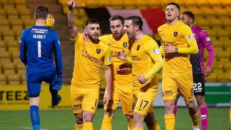 Steven Lawless celebrates his composed finish from the penalty spot