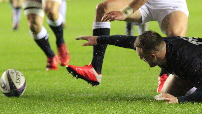 Stuart Hogg manages to dot the ball down before farrell can score