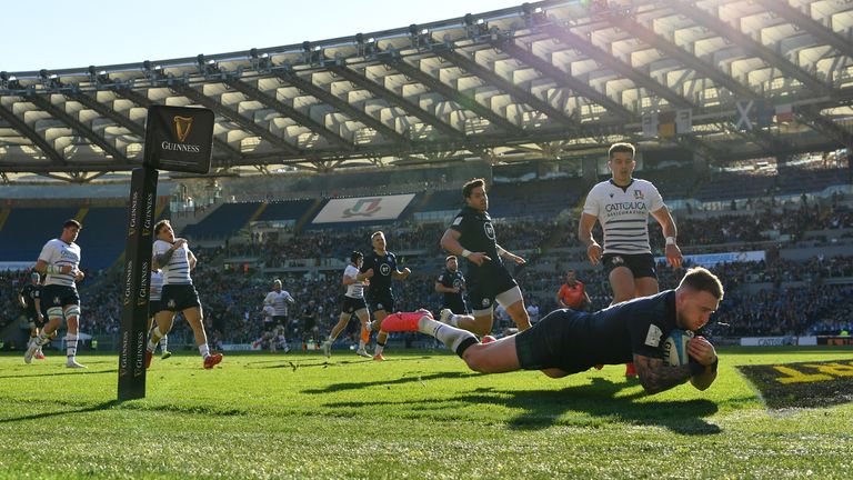 Stuart Hogg of Scotland goes over to score his sides first try during the 2020 Guinness Six Nations match between Italy and Scotland at Stadio Olimpico on February 22, 2020 in Rome
