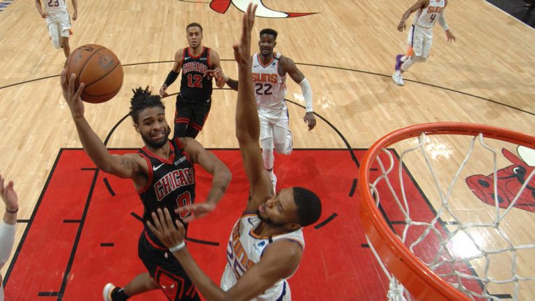 Coby White of the Chicago Bulls shoots the ball against the Phoenix Suns