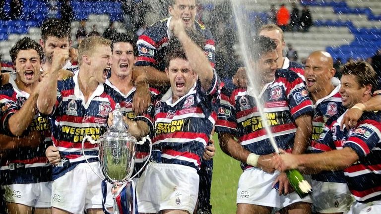 Sydney City Roosters celebrate winning the World Club Challenge match against St Helens at Bolton's Reebok Stadium.