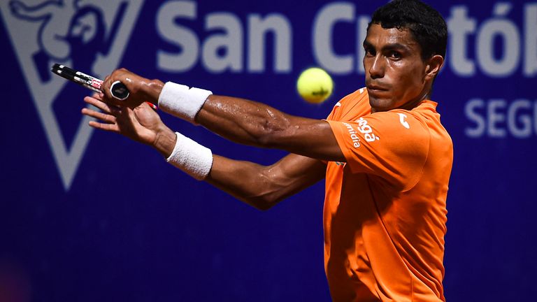 Thiago Monteiro of Brazil hits a backhand during his Men&#39;s Singles match against Borna Coric of Croatia during day 3 of ATP Buenos Aires Argentina Open at Buenos Aires Lawn Tennis Club on February 12, 2020 in Buenos Aires, Argentina.