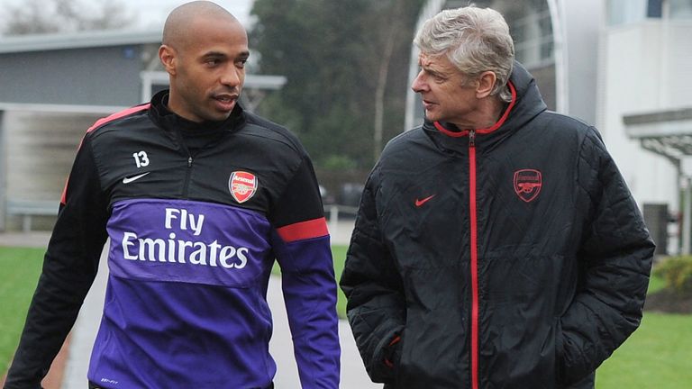 ST ALBANS, ENGLAND - DECEMBER 28:  Arsenal manager Arsene Wenger with ex player Thierry Henry before a training session at London Colney on December 28, 2012 in St Albans, England.  (Photo by Stuart MacFarlane/Arsenal FC via Getty Images)