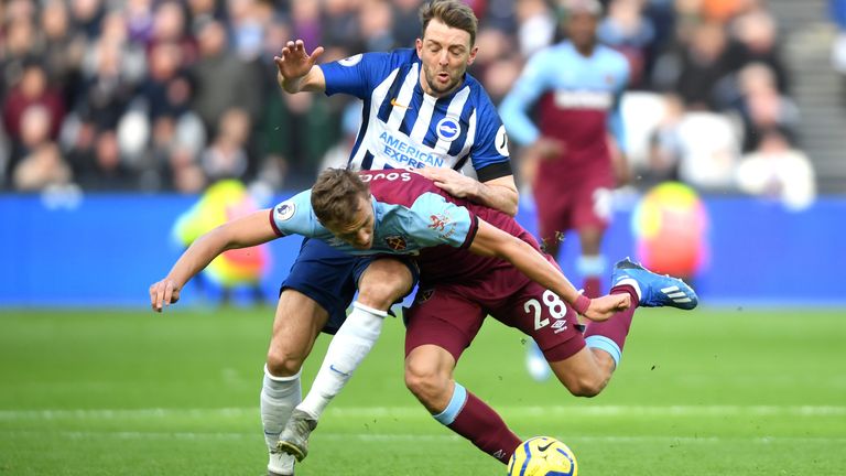 Tomas Soucek of West Ham United is challenged by Dale Stephens of Brighton 
