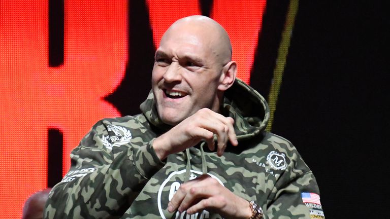 Tyson Fury waves to his fans as he weighs in at 173 pounds at todays weigh-in at MGM Grand Hotel Friday February 21, 2020. Tyson Fury will be fighting Deontay Wilder for the second time Saturday for the world heavyweight championship Saturday in Las Vegas, Nevada