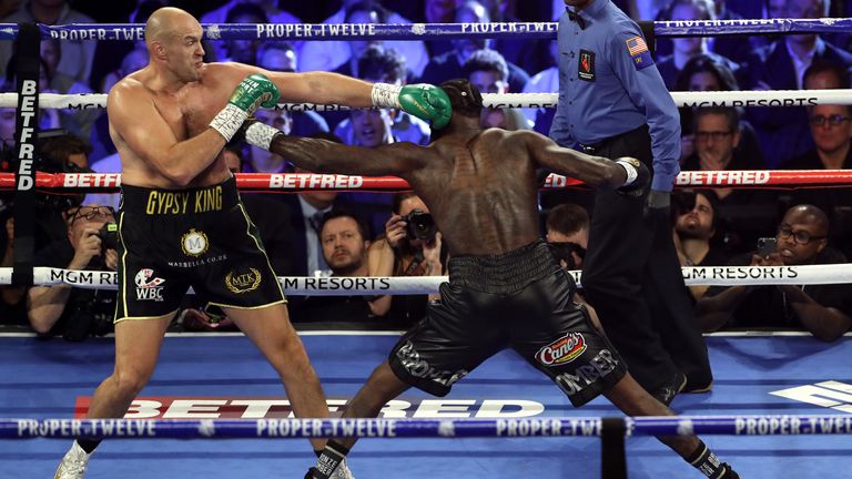 Tyson Fury (left) and Deontay Wilder during the World Boxing Council World Heavy Title bout at the MGM Grand, Las Vegas. PA Photo. Picture date: Saturday February 22, 2020. See PA story BOXING Las Vegas. Photo credit should read: Bradley Collyer/PA Wire.
