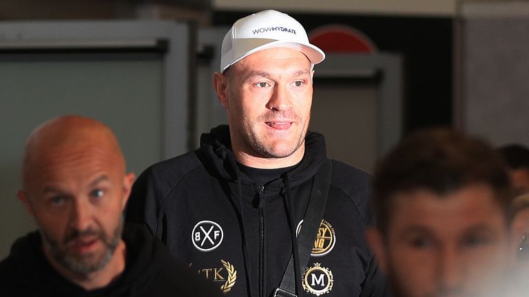Tyson Fury arrives at Manchester Airport following his WBC heavyweight championship rematch with Deontay Wilder