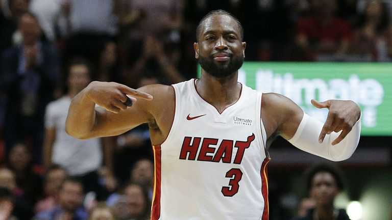 Dwyane Wade #3 of the Miami Heat reacts after hitting a three pointer against the Philadelphia 76ers during the second half at American Airlines Arena