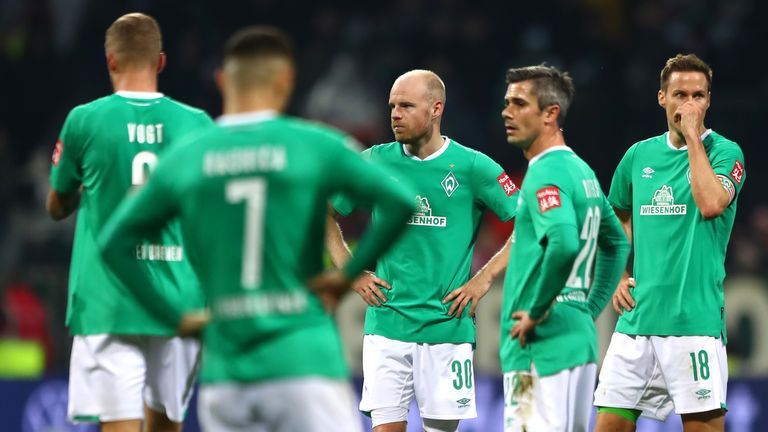 Werder Bremen players looking dejected