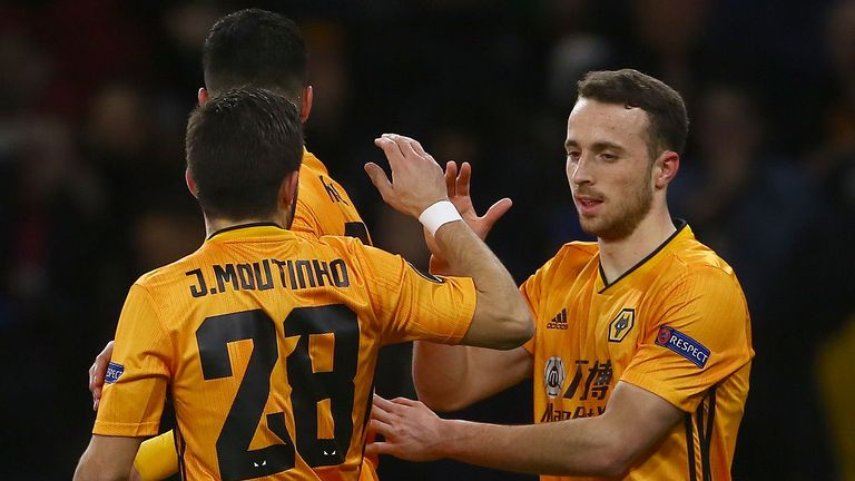 Diogo Jota (R) celebrates scoring with Wolves team-mate Joao Moutinho