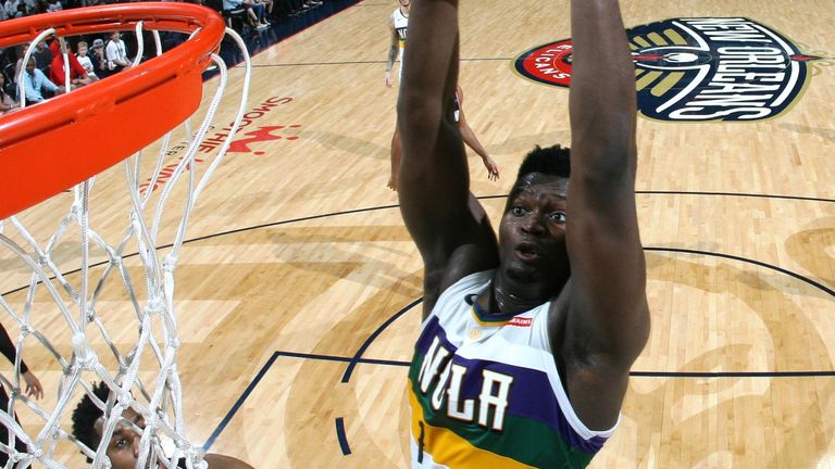 Zion WIlliamson throws down a dunk against the Portland Trail Blazers