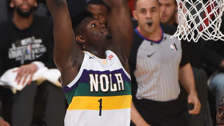 Zion Williamson throws down a two-handed dunk against the Los Angeles Lakers