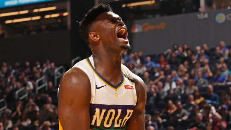 Zion Williiamson celebrates a Pelicans basket against the Warriors