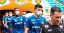 Gremio wear masks in protest at having to play