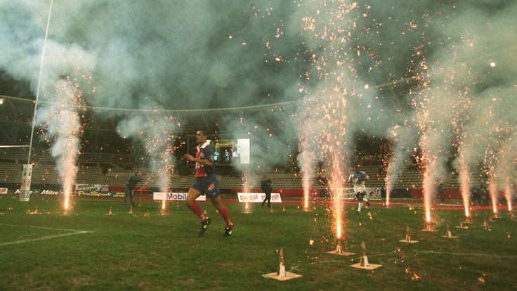 RUGBY LEAGUE - SUPERLEAGUE - Paris St Germain v Sheffield Eagles
Players run through a tunnel of fireworks and enter the pitch for the start of the Super League at Stade Charetly, Paris