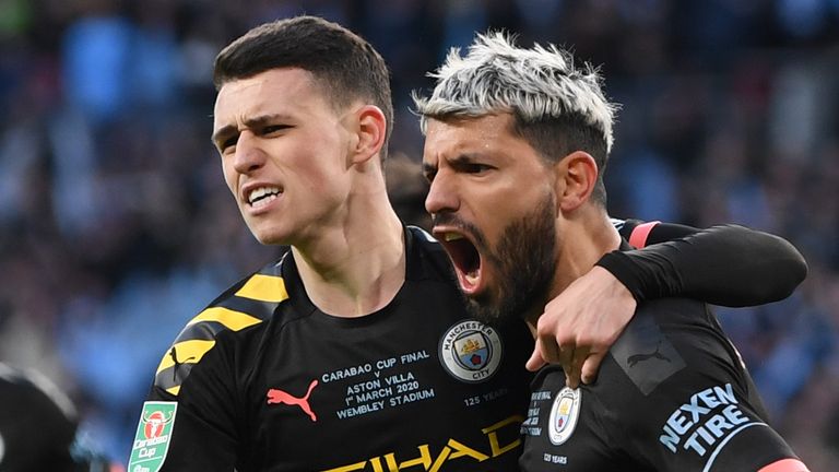 Sergio Aguero and Phil Foden celebrate the opening goal in the Carabao Cup Final