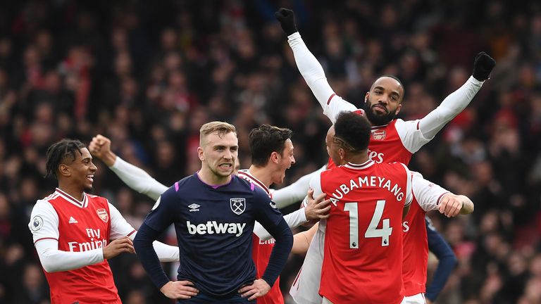 Alexandre Lacazette celebrates his goal against West Ham