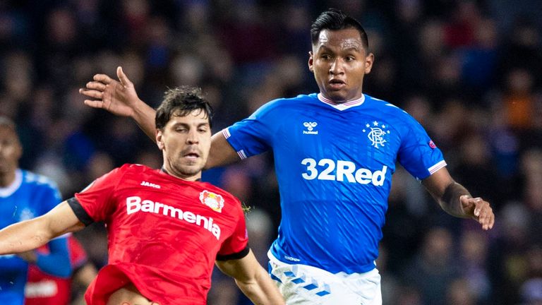 Bayer Leverkusen's Aleksander Dragovic (L) is pictured in action with Rangers' Alfredo Morelos
