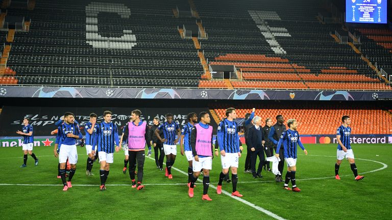 Atalanta celebrate their win in an empty stadium