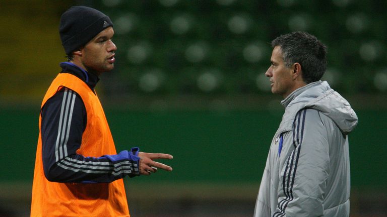 Michael Ballack speaks with Chelsea manager Jose Mourinho