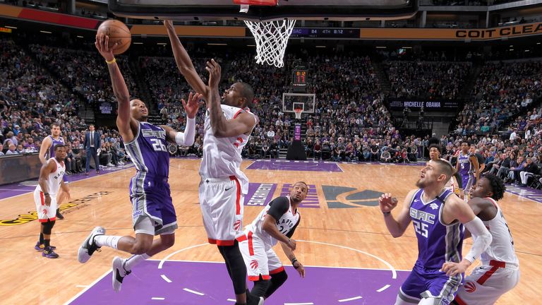 Kent Bazemore of the Sacramento Kings drives to the basket during a game against the Toronto Raptors