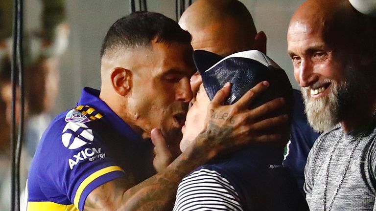 Carlos Tevez kisses Diego Maradona for luck ahead of Saturday's match