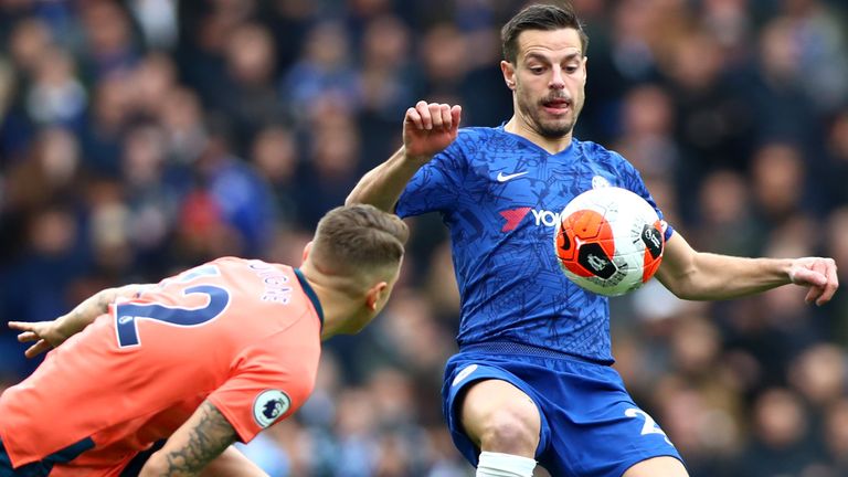 Chelsea defender Cesar Azpilicueta keeps possession under pressure from Lucas Digne 