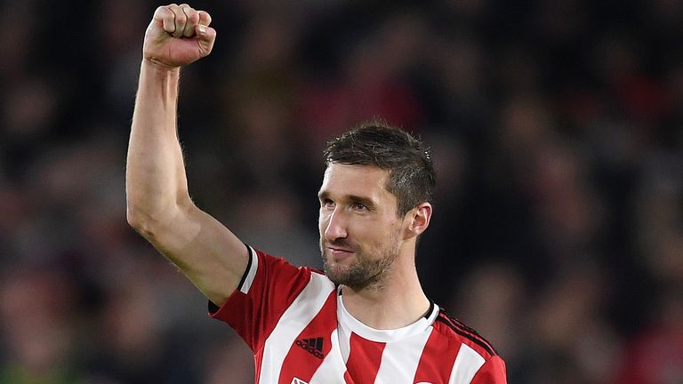 Chris Basham of Sheffield United celebrates after his teams victory in the Premier League match between Sheffield United and Arsenal FC at Bramall Lane on October 21, 2019 in Sheffield, United Kingdom.