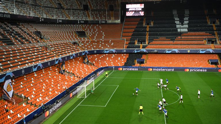 Josip Ilicic of Atalanta scores his team's first goal against  Valencia as they are forced to play behind closed doors due to the Coronavirus pandemic