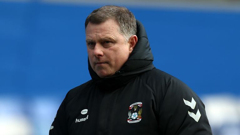 Mark Robins celebrated victory in his 200th game in charge