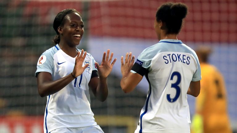 Danielle Carter (left) celebrates an England goal with Demi Stokes