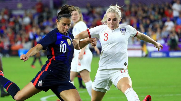 Alex Greenwood (right) in action up against Carli Lloyd in the SheBelieves Cup
