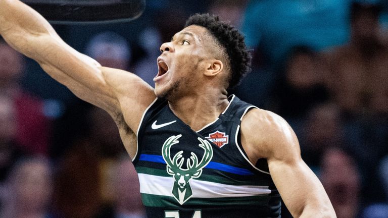 Giannis Antetokounmpo throws down a dunk against the Charlotte Hornets