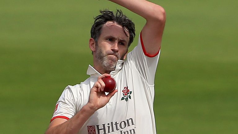 MANCHESTER, ENGLAND - JULY 23:  Graham Onions (R) of Lancashire bowls during day two of the Specsavers County Championship division one match between Lancashire and Yorkshire at Emirates Old Trafford on July 23, 2018 in Manchester, England. (Photo by Clint Hughes/Getty Images)