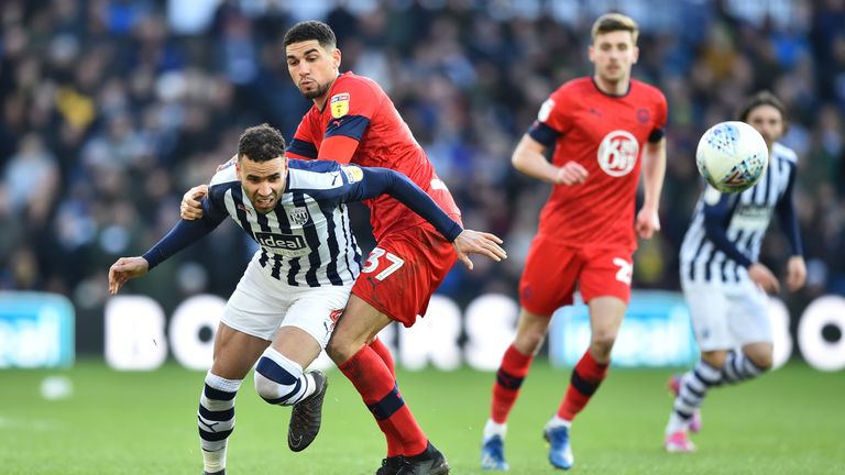Hal Robson-Kanu attempts to get away from Leon Balogun during the Championship match between West Brom and Wigan