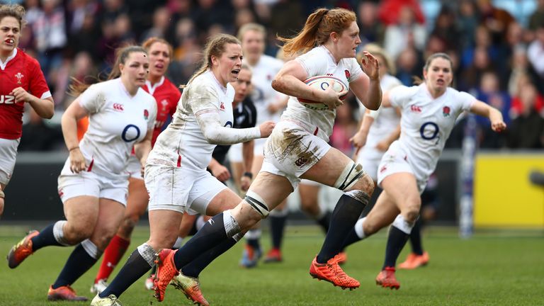 Harriet Millar-Mills of England makes a break to score her sides fourth try during the Women&#39;s Six Nations match between England and Wales