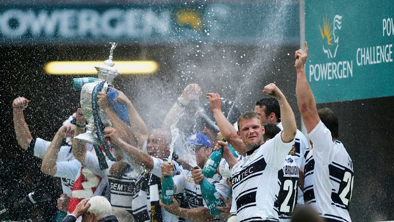 CARDIFF , WALES - AUGUST 27:  The Hull team celebrate winning the Powergen Challenge Cup Final between Hull FC and Leeds Rhinos at the Millennium Stadium on August 27, 2005 in Cardiff, Wales  (Photo by Warren LIttle/Getty Images)